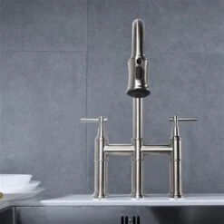 Clihome 17.32-in Nickel Bridge Kitchen Faucet With Pull-Down Sprayhead In Spot -Alliedbas Shop 330992854 AlternateImage2 l