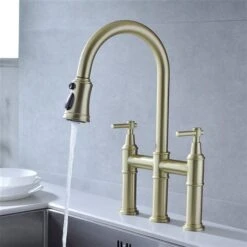 Clihome 17.32-in Gold Bridge Kitchen Faucet With Pull-Down Sprayhead In Spot 7 Clihome 17.32-in Gold Bridge Kitchen Faucet With Pull-Down Sprayhead In Spot -Alliedbas Shop 330992857 AlternateImage3 l